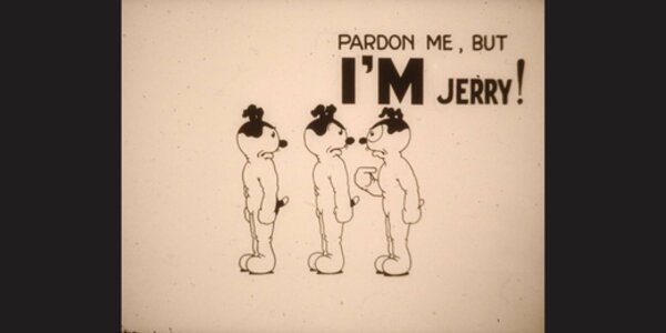 A screenshot of a Jerry the Tyke animation, showing three 'Jerrys', two looking back at one who has a speech bubble that reads 'Excuse me, but I'M Jerry!'.