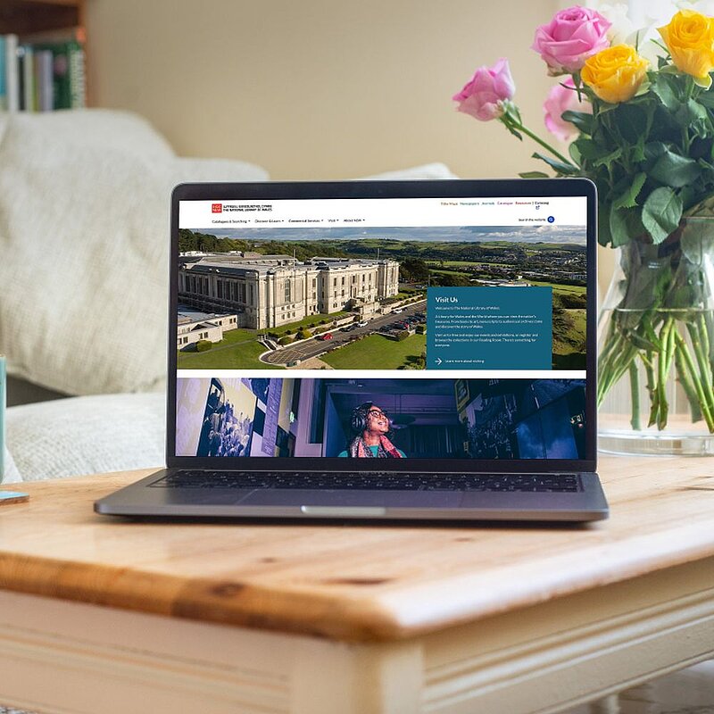 Image of a laptop showing the Library website
