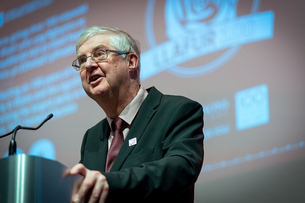 Rt. Hon. Mark Drakeford MS taking from a lectern 
