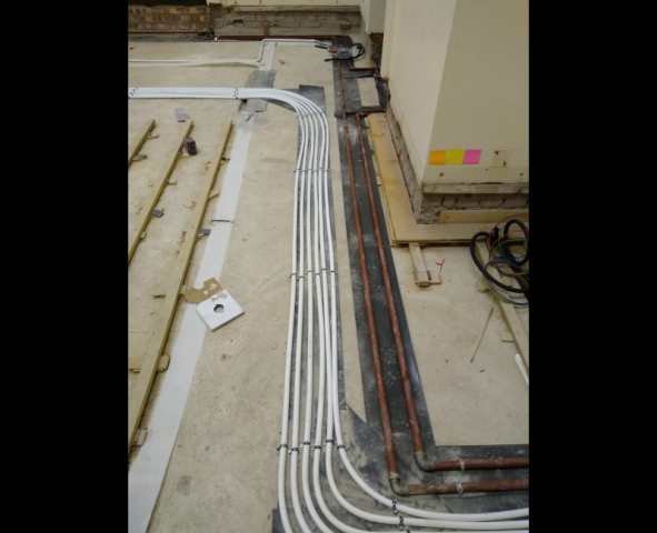 New heating pipes and electricity cables in the Admin Block npc