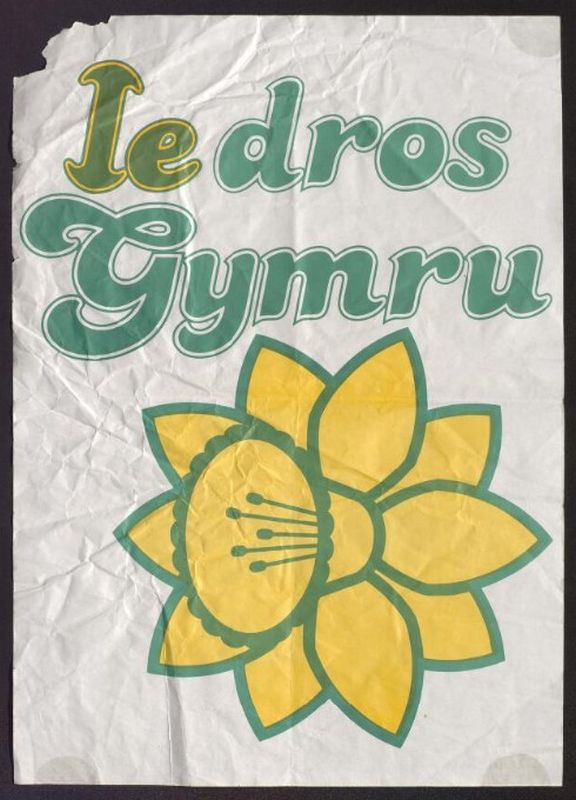 A poster from the Welsh Poitical Ephemera Collection showing a daffodil under the phrase 'Ie Dros Gymru'