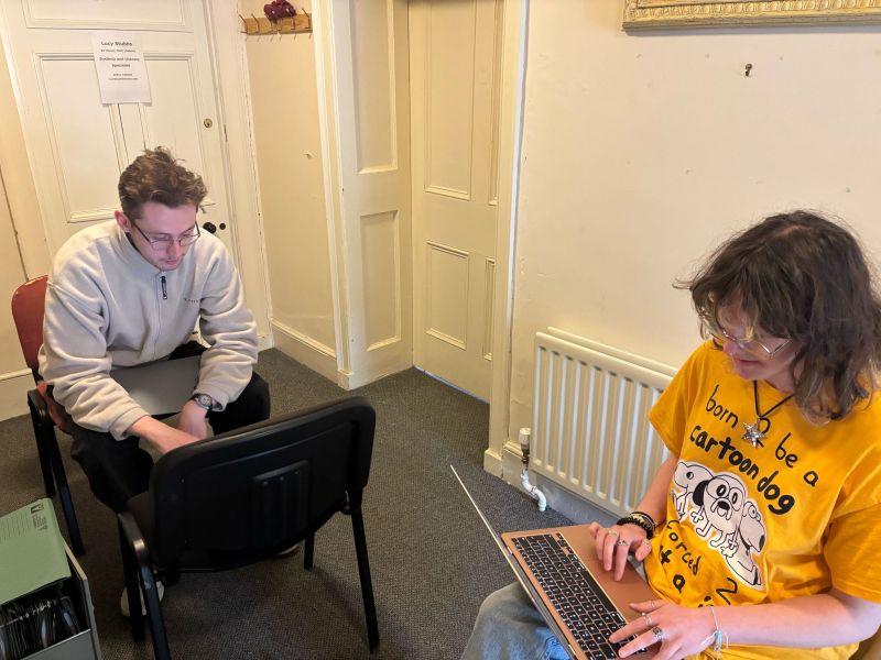 Two students working on the 'EcoDyfi' project