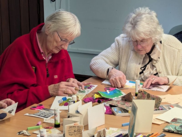 Members of Borth Community Hub enjoying a printmaking workshop h