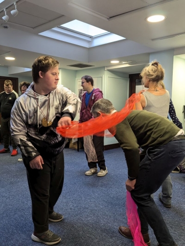 Ray Ceredigion's DYMA NI group participating in a gentle movement session h