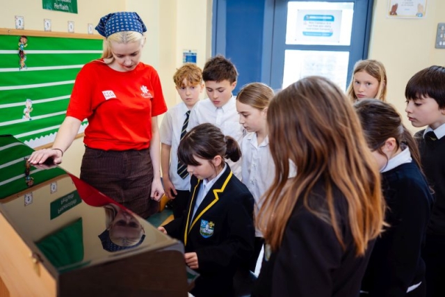 Pupils playing the piano h