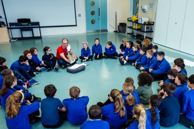 Pupils learning about the Library's collections h