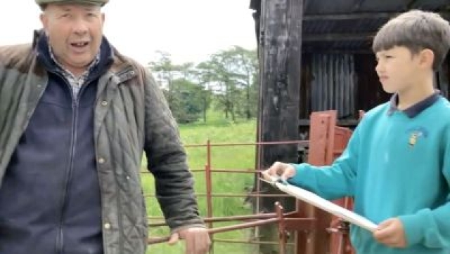A school pupil interviewing a farmer cc
